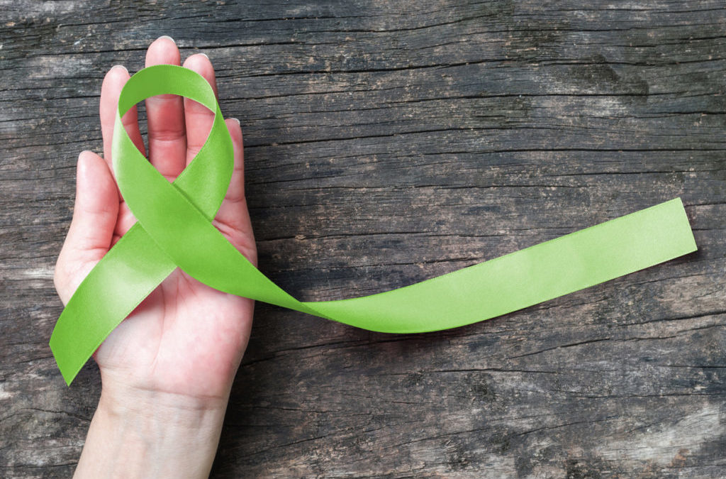 Lime green ribbon to raise awareness of mental health illness in the month of may